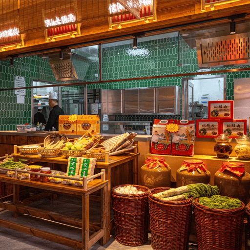 Chef preparing signature noodles